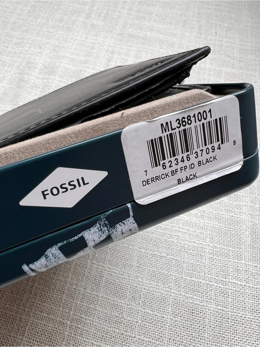 Fossil derrick leather